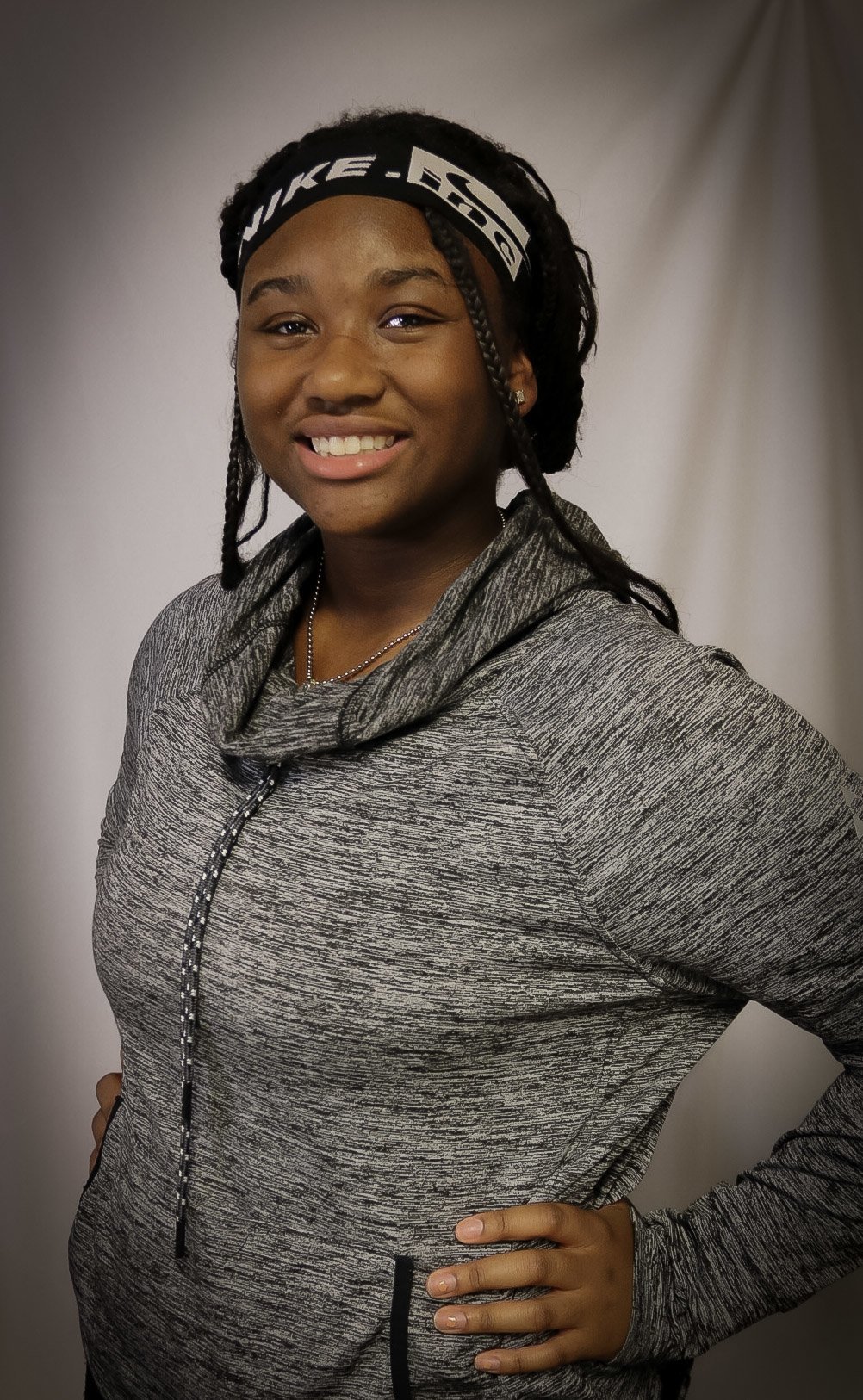 Mackenzie Kyles stands smiling.